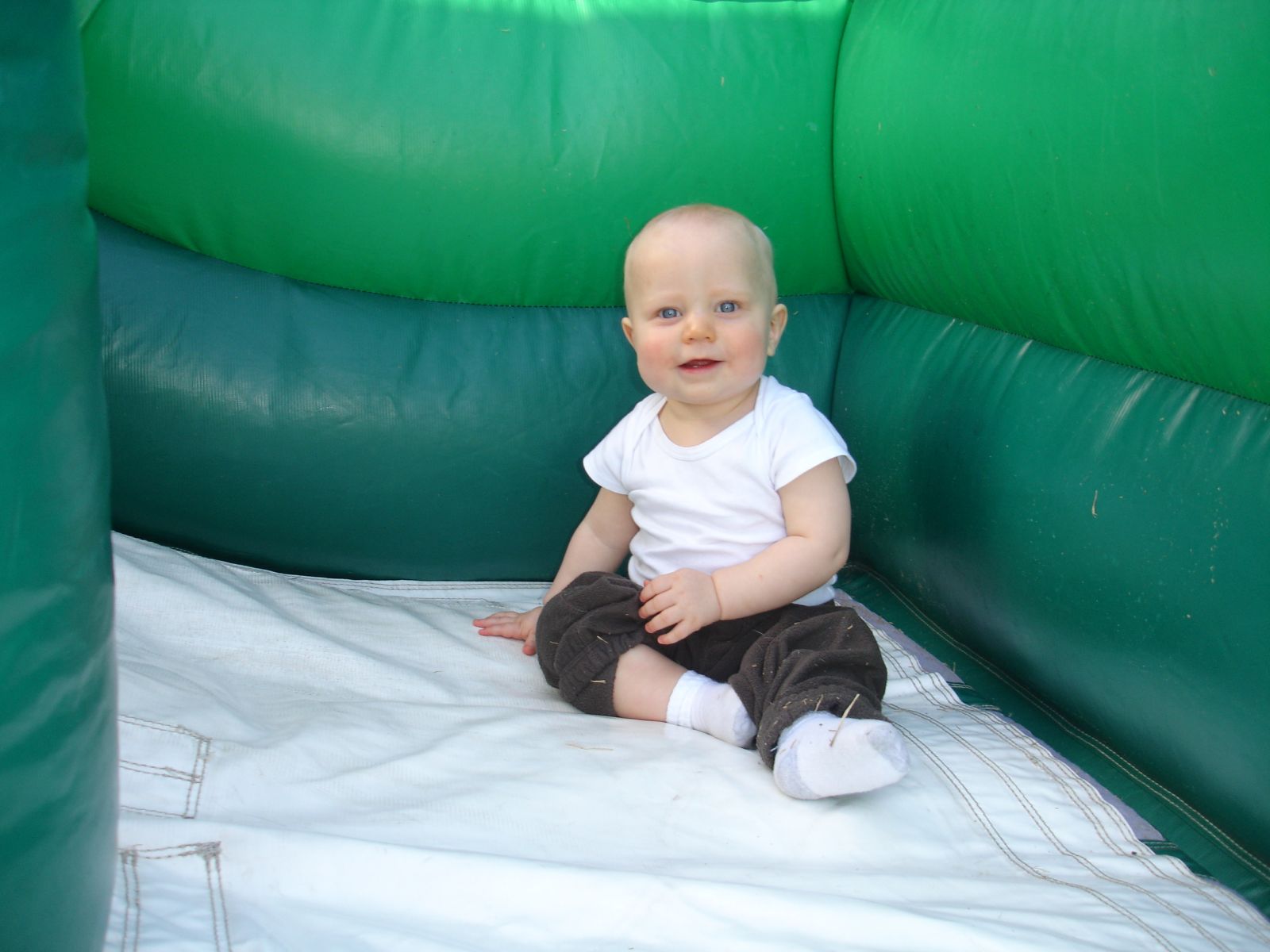 Young child at the end of the slide in the Zoo Combo